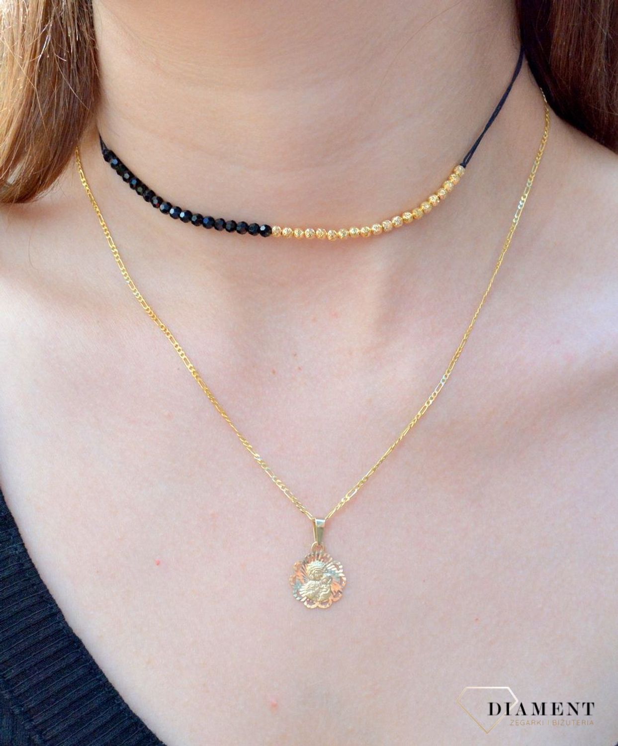 Zawieszka złota 333 medalik okrągły 'Matka Boska' ZA 6760C 333. Medalik będący wspaniałą pamiątką i prezentem z okazji chrztu, komunii czy bierzmowania. Zawieszka wykonana ze złota próby 333..jpg